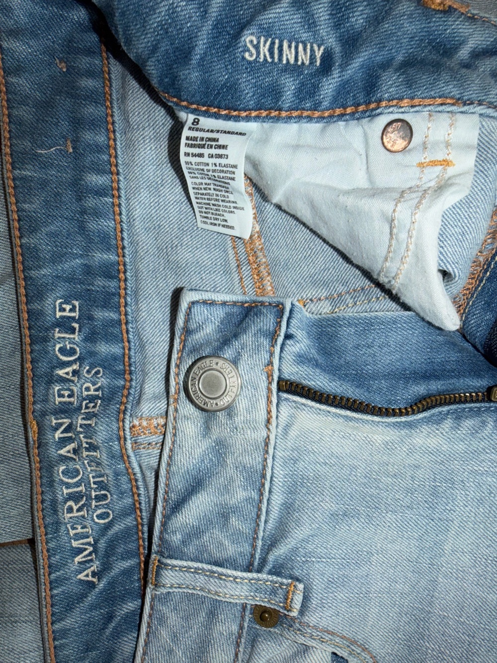 American Eagle Outfitters Light Wash Distressed Denim Skinny Jeans - Picture 2 of 6